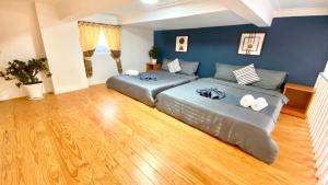 Postel nebo postele na pokoji v ubytování Lê Mùi Hotel - Apartment