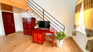 TV a/nebo společenská místnost v ubytování Lê Mùi Hotel - Apartment