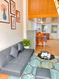 Kuchyň nebo kuchyňský kout v ubytování Lê Mùi Hotel - Apartment