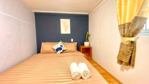 Postel nebo postele na pokoji v ubytování Lê Mùi Hotel - Apartment