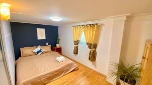 Postel nebo postele na pokoji v ubytování Lê Mùi Hotel - Apartment