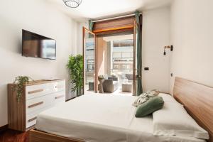 Postel nebo postele na pokoji v ubytování Giramondo Dreamairport