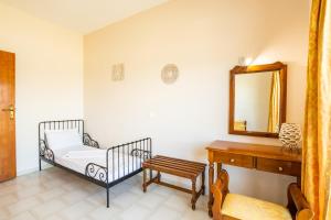 Postel nebo postele na pokoji v ubytování Sun Beach Apartments