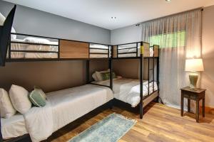 Letto o letti in una camera di Log cabin with HOT TUB and view