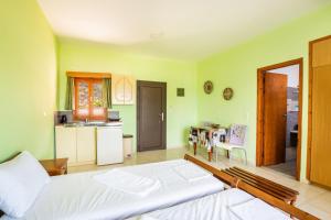 Kuchyň nebo kuchyňský kout v ubytování Sun Beach Apartments