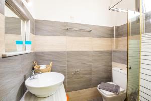 Koupelna v ubytování Sun Beach Apartments