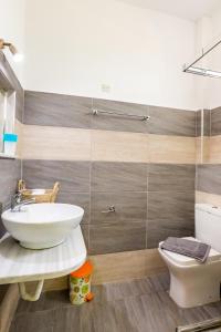 Koupelna v ubytování Sun Beach Apartments