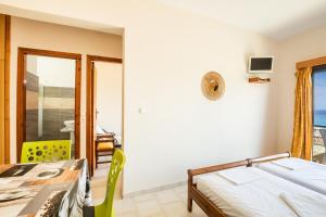 Postel nebo postele na pokoji v ubytování Sun Beach Apartments