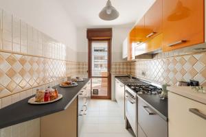 Kuchyň nebo kuchyňský kout v ubytování Giramondo Dreamairport