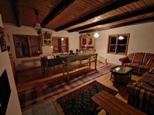 Posezení v ubytování Nettes Ferienhaus In Telgárt + 14 fotografií