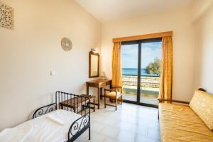 Postel nebo postele na pokoji v ubytování Sun Beach Apartments