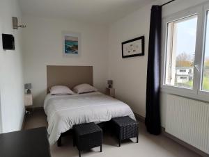 Ένα ή περισσότερα κρεβάτια σε δωμάτιο στο La Villa du Cap - indoor pool - billiards table +30 φωτογραφίες