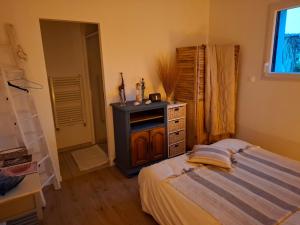 Ένα ή περισσότερα κρεβάτια σε δωμάτιο στο Chambre d'hôtes Nova, petit déjeuner compris +5 φωτογραφίες