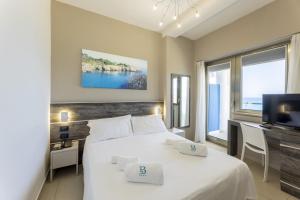 Letto o letti in una camera di Hotel Belvedere