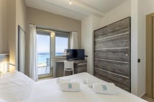 Letto o letti in una camera di Hotel Belvedere