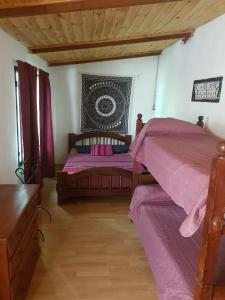 Postel nebo postele na pokoji v ubytování La Casa De La Gruta