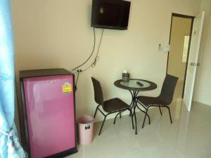 TV a/nebo společenská místnost v ubytování Bann Lom Le Guest House + 12 fotografií