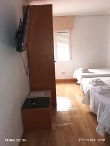 Posteľ alebo postele v izbe v ubytovaní Hotel Principe