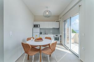 Kuchyň nebo kuchyňský kout v ubytování Seaside Luxury Apartments