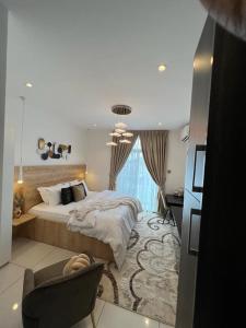 Ένα ή περισσότερα κρεβάτια σε δωμάτιο στο The Gardens Apartments, Accra +52 φωτογραφίες