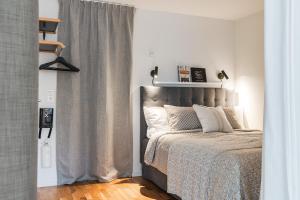 Postel nebo postele na pokoji v ubytování KAI studio