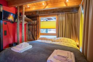 Letto o letti in una camera di Chalet Schwalbennest