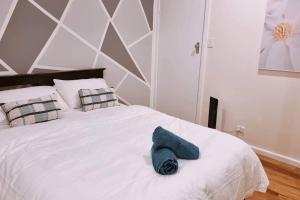 Ένα ή περισσότερα κρεβάτια σε δωμάτιο στο Spacious House - Sleeps 8