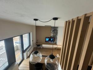 Televízia a/alebo spoločenská miestnosť v ubytovaní Apartment VAŇKOVKA