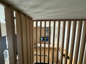 Televízia a/alebo spoločenská miestnosť v ubytovaní Apartment VAŇKOVKA