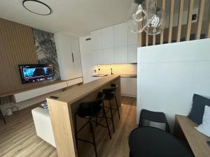 Kuchyňa alebo kuchynka v ubytovaní Apartment VAŇKOVKA