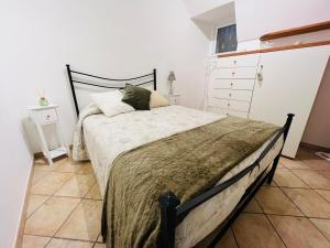 Ένα ή περισσότερα κρεβάτια σε δωμάτιο στο Suite Elsa - Sanremo +15 φωτογραφίες