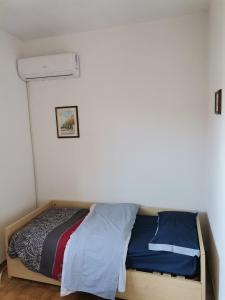 Postel nebo postele na pokoji v ubytování Camera in appartamento