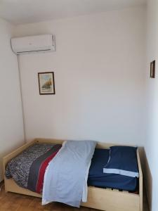Postel nebo postele na pokoji v ubytování Camera in appartamento