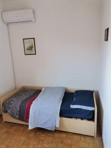 Postel nebo postele na pokoji v ubytování Camera in appartamento