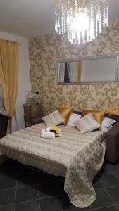 Postel nebo postele na pokoji v ubytování Giramondo Guest house