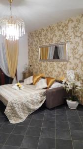 Postel nebo postele na pokoji v ubytování Giramondo Guest house