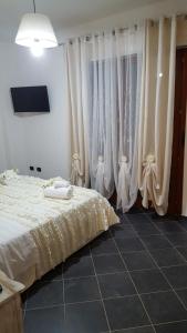 Postel nebo postele na pokoji v ubytování Giramondo Guest house