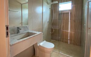 Koupelna v ubytování Lusobra Flats Maragogi