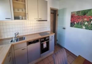 Küche/Küchenzeile in der Unterkunft Ferienwohnung S-Bahn Nähe