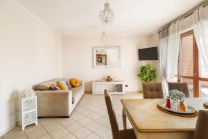 TV a/nebo společenská místnost v ubytování Giramondo Guest house