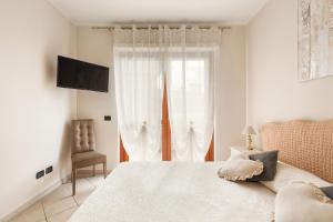 TV a/nebo společenská místnost v ubytování Giramondo Guest house