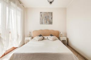 Postel nebo postele na pokoji v ubytování Giramondo Guest house