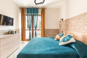 Postel nebo postele na pokoji v ubytování Giramondo Guest house