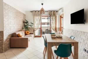 TV a/nebo společenská místnost v ubytování Giramondo Guest house