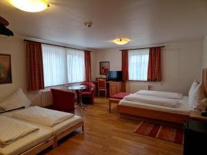 Postel nebo postele na pokoji v ubytování Landgasthof Krone