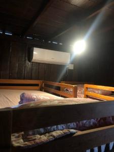 Letto o letti in una camera di Kite Point Atins