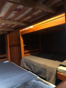 Letto o letti in una camera di Kite Point Atins