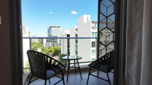 Parveke tai terassi majoituspaikassa HOUZE - Stay & Residences by AVA