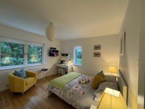 Postel nebo postele na pokoji v ubytování Elm Grove, Family Room