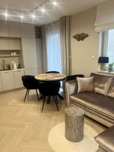Η κουζίνα ή μικρή κουζίνα στο Apartament Kaszmirowy